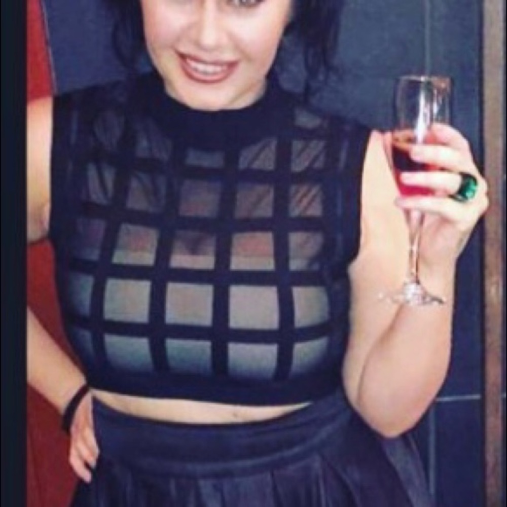 Crop Top. Fits like a medium. NEW